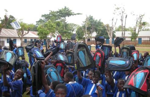 Joy-all-over-the-compound-as-the-children-of-Bwetyaaba-Primary-School-recieved-the-GBP-donations-on-10th-December-2013-1.jpg